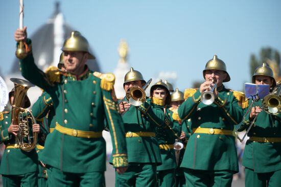 Procession of participants in international military music festival, Spasskaya Tower, at VDNKh