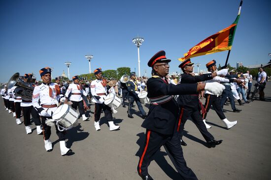 Procession of participants in international military music festival, Spasskaya Tower, at VDNKh