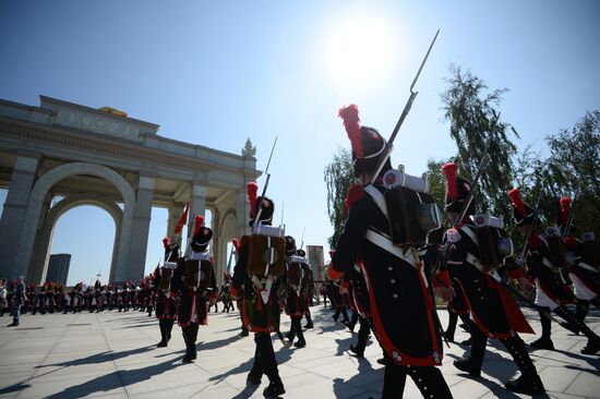 Procession of participants in international military music festival, Spasskaya Tower, at VDNKh