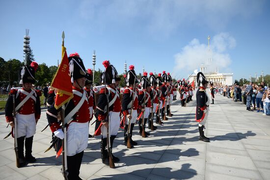 Procession of participants in international military music festival, Spasskaya Tower, at VDNKh