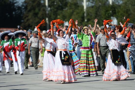 Procession of participants in international military music festival, Spasskaya Tower, at VDNKh