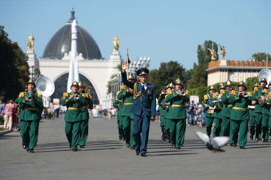 Procession of participants in international military music festival, Spasskaya Tower, at VDNKh