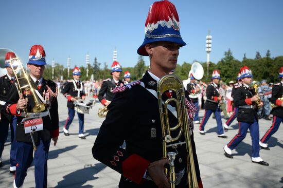 Procession of participants in international military music festival, Spasskaya Tower, at VDNKh