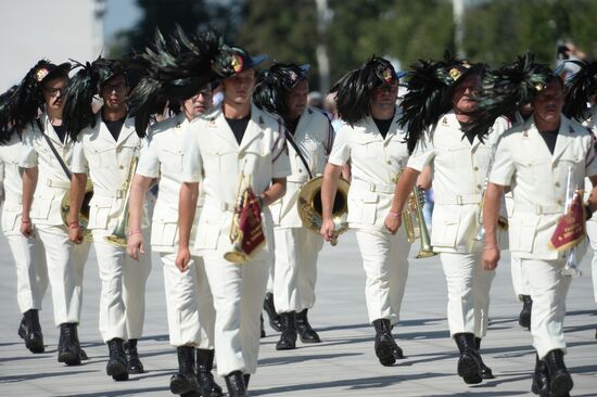 Procession of participants in international military music festival, Spasskaya Tower, at VDNKh