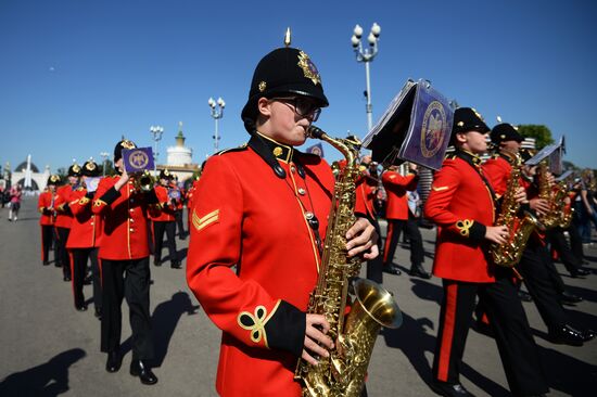 Procession of participants in international military music festival, Spasskaya Tower, at VDNKh