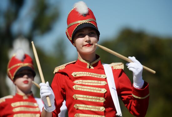 Procession of participants in international military music festival, Spasskaya Tower, at VDNKh
