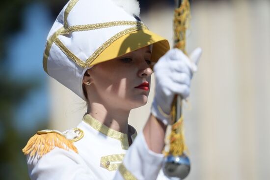 Procession of participants in international military music festival, Spasskaya Tower, at VDNKh