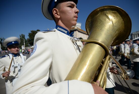 Procession of participants in international military music festival, Spasskaya Tower, at VDNKh