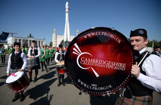Procession of participants in international military music festival, Spasskaya Tower, at VDNKh