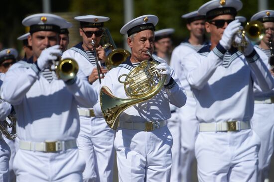 Procession of participants in international military music festival, Spasskaya Tower, at VDNKh