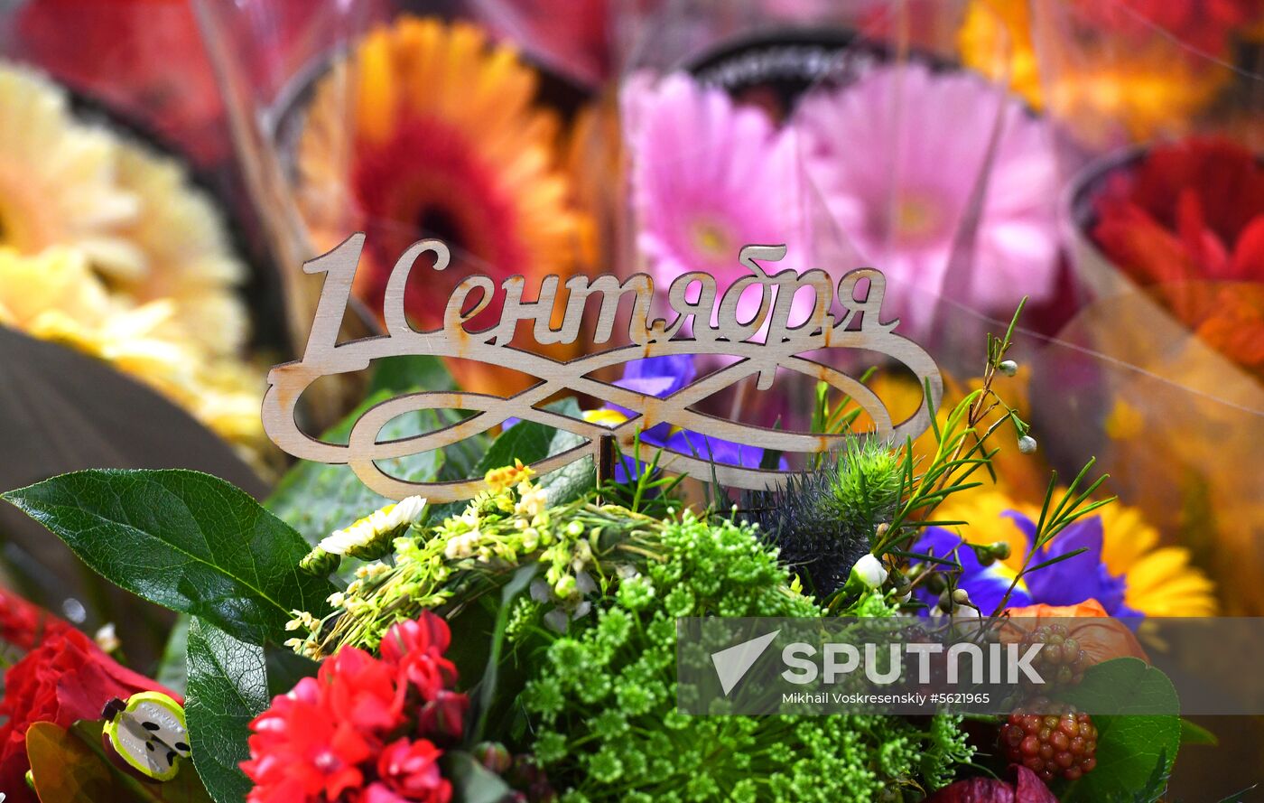 Selling flowers ahead of school year