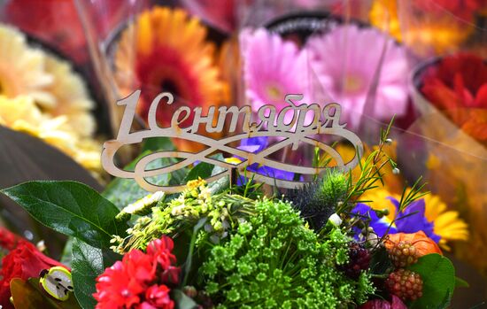 Selling flowers ahead of school year