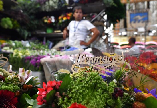 Selling flowers ahead of school year