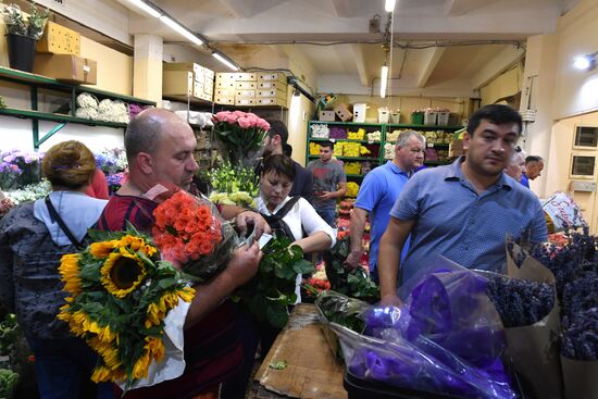 Selling flowers ahead of school year