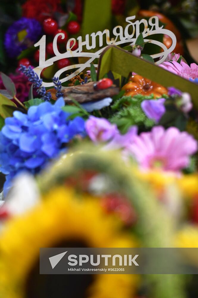 Selling flowers ahead of school year