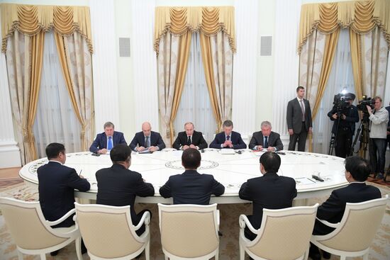 Russian President Vladimir Putin meets with First Vice Premier of State Council of China Han Zheng