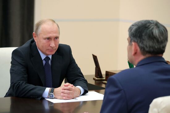 President Vladimir Putin meets with Kazbek Kokov