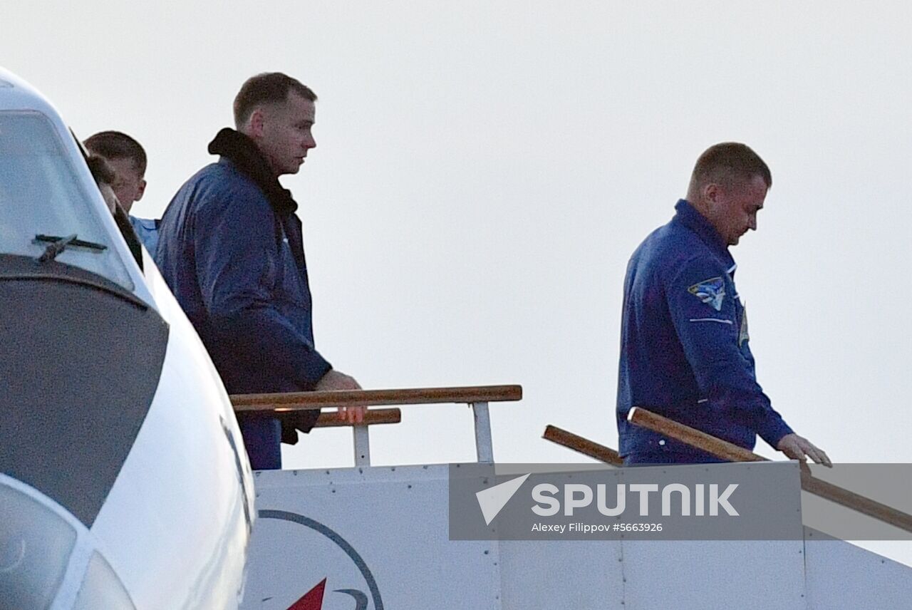 Roskosmos cosmonaut Aleksey Ovchinin, of Russia, right, and NASA astronaut Nick Hague, of the United States, walk down the runway after landing at the Krainyi airport, outside Baikonur, Kazakhstan, October 11, 2018. The two were safe after an emergency landing in the steppes of Kazakhstan following the failure of a Russian booster rocket carrying them to the International Space Station. Location: Kazakhstan, . Author: Alexey Filippov/Sputnik. Kazakhstan Russia Space