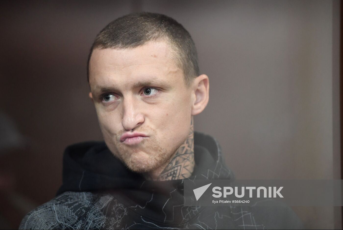 Soccer player Pavel Mamaev waits in a court room in Moscow, Russia, October 11, 2018. The Tverskoy District Court is considering to put soccer players Pavel Mamaev and Alexander Kokorin under arrest after two brawl incidents. On Monday media reported that the two attacked other men ending up with head injuries and hospitalization of the victims. Location: Russia, Moscow. Author: Ilya Pitalev/Sputnik. Russia Soccer Kokorin Mamaev