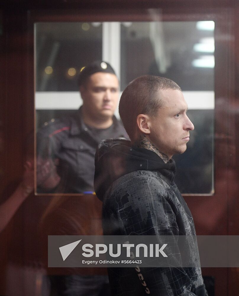 Soccer player Pavel Mamaev waits in a court room in Moscow, Russia, October 11, 2018. The Tverskoy District Court is considering to put soccer players Pavel Mamaev and Alexander Kokorin under arrest after two brawl incidents. On Monday media reported that the two attacked other men ending up with head injuries and hospitalization of the victims. Location: Russia, Moscow. Author: Evgeny Odinokov/Sputnik. Russia Soccer Kokorin Mamaev