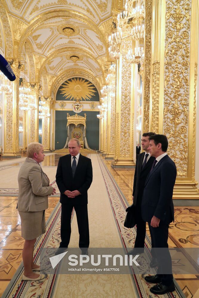 President Vladimir Putin meets with Italian Prime Minister Giuseppe Conte