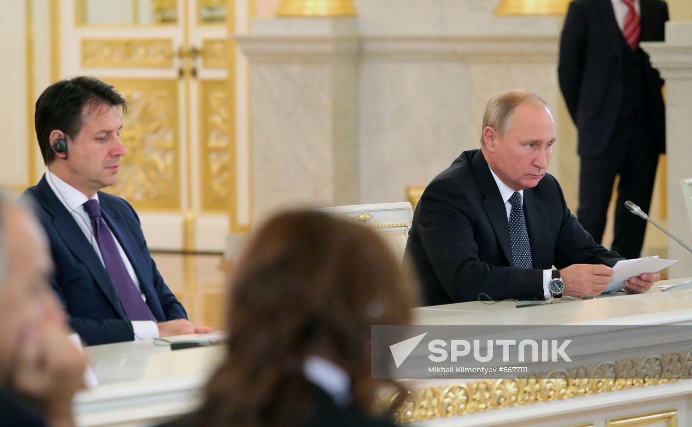 President Vladimir Putin meets with Italian Prime Minister Giuseppe Conte