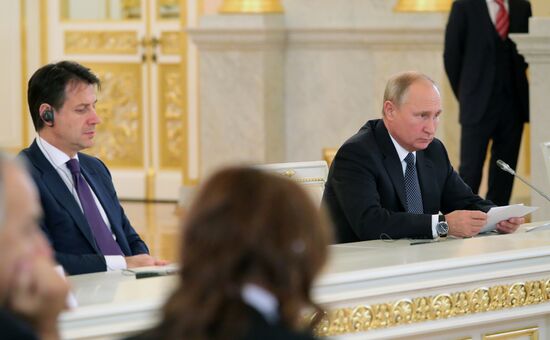 President Vladimir Putin meets with Italian Prime Minister Giuseppe Conte