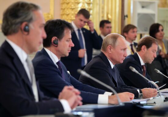 President Vladimir Putin meets with Italian Prime Minister Giuseppe Conte