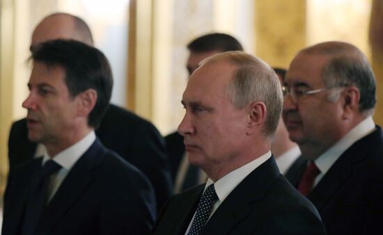 President Vladimir Putin meets with Italian Prime Minister Giuseppe Conte