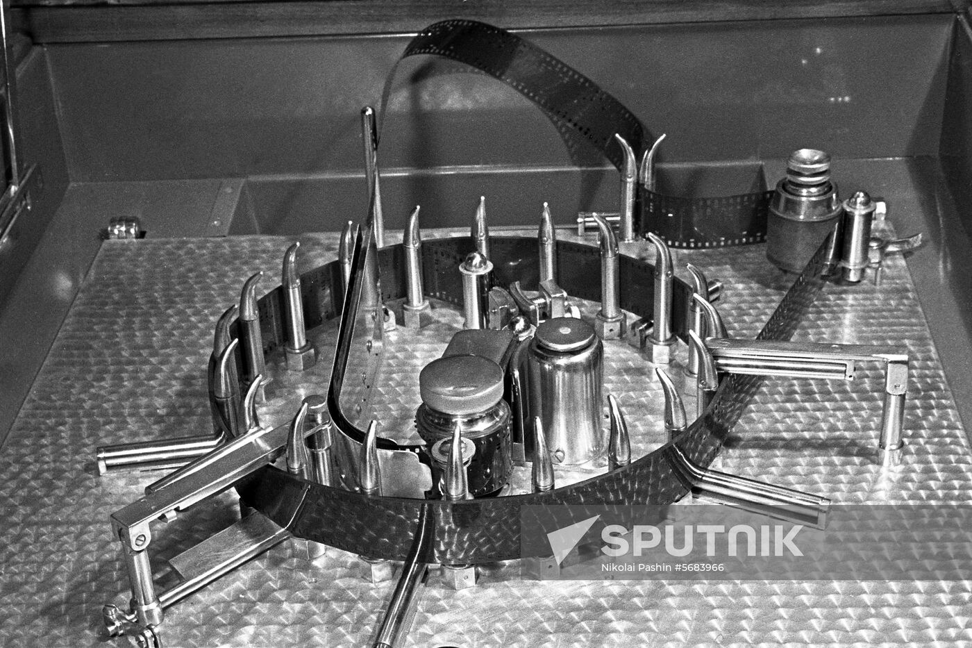 Motion-picture film perforator