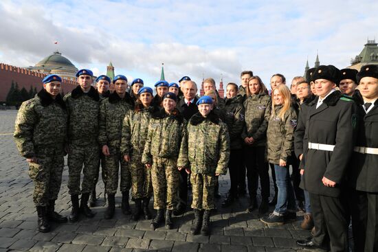 President Vladimir Putin lays flowers at Monument to Minin and Pozharsky