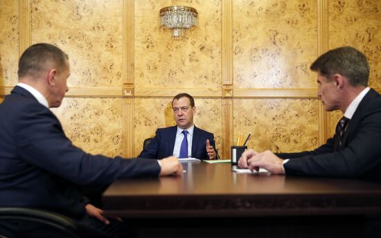 Prime Minister Dmitry Medvedev meets with Primorye Territory's Acting Governor Oleg Kozhemyako and Presidential Envoy to FEFD Yury Trutnev