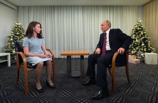 President Vladimir Putin gives interview to Regina Parpiyeva following his news conference