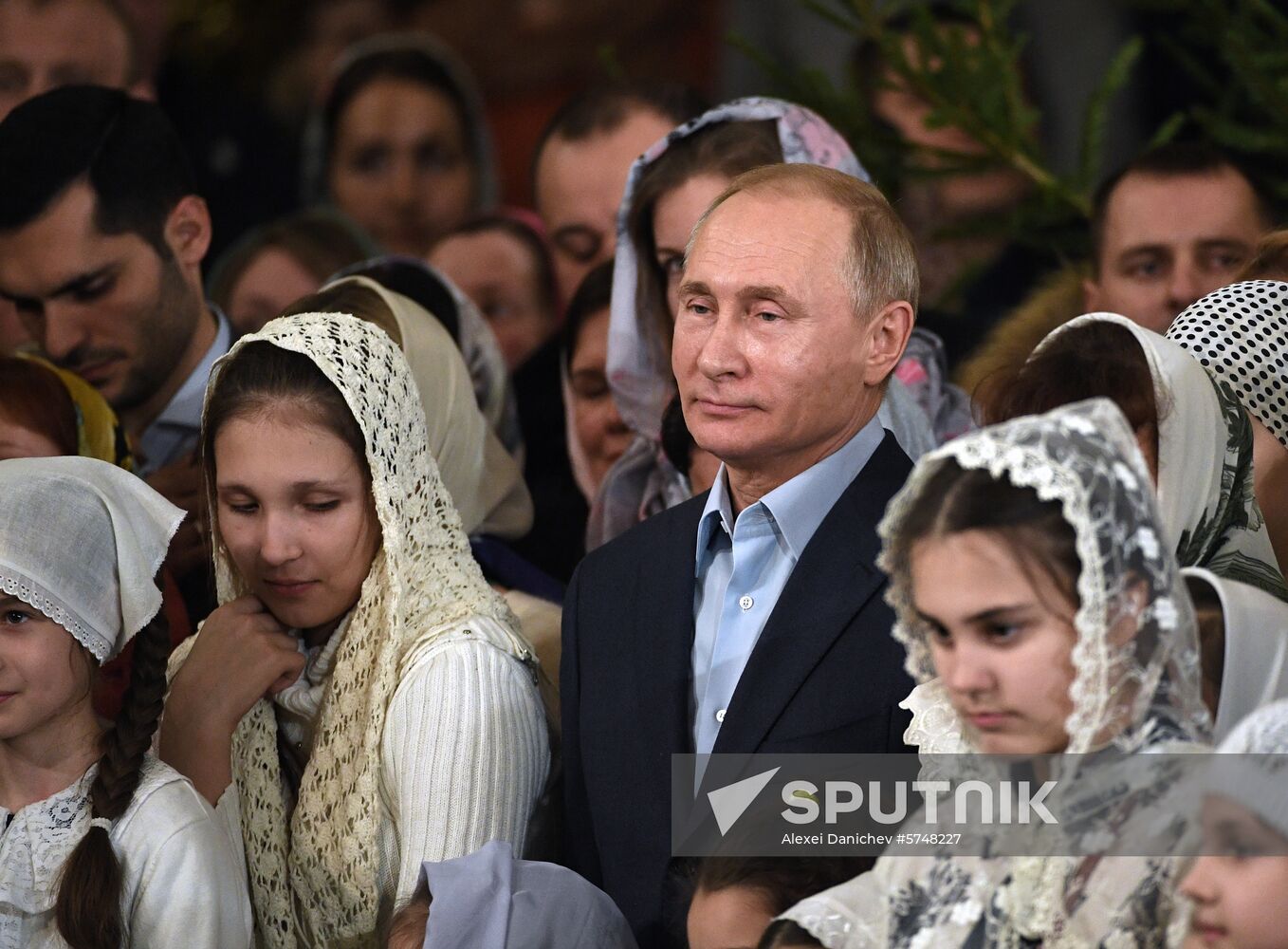 Russian President Putin attends Christmas service