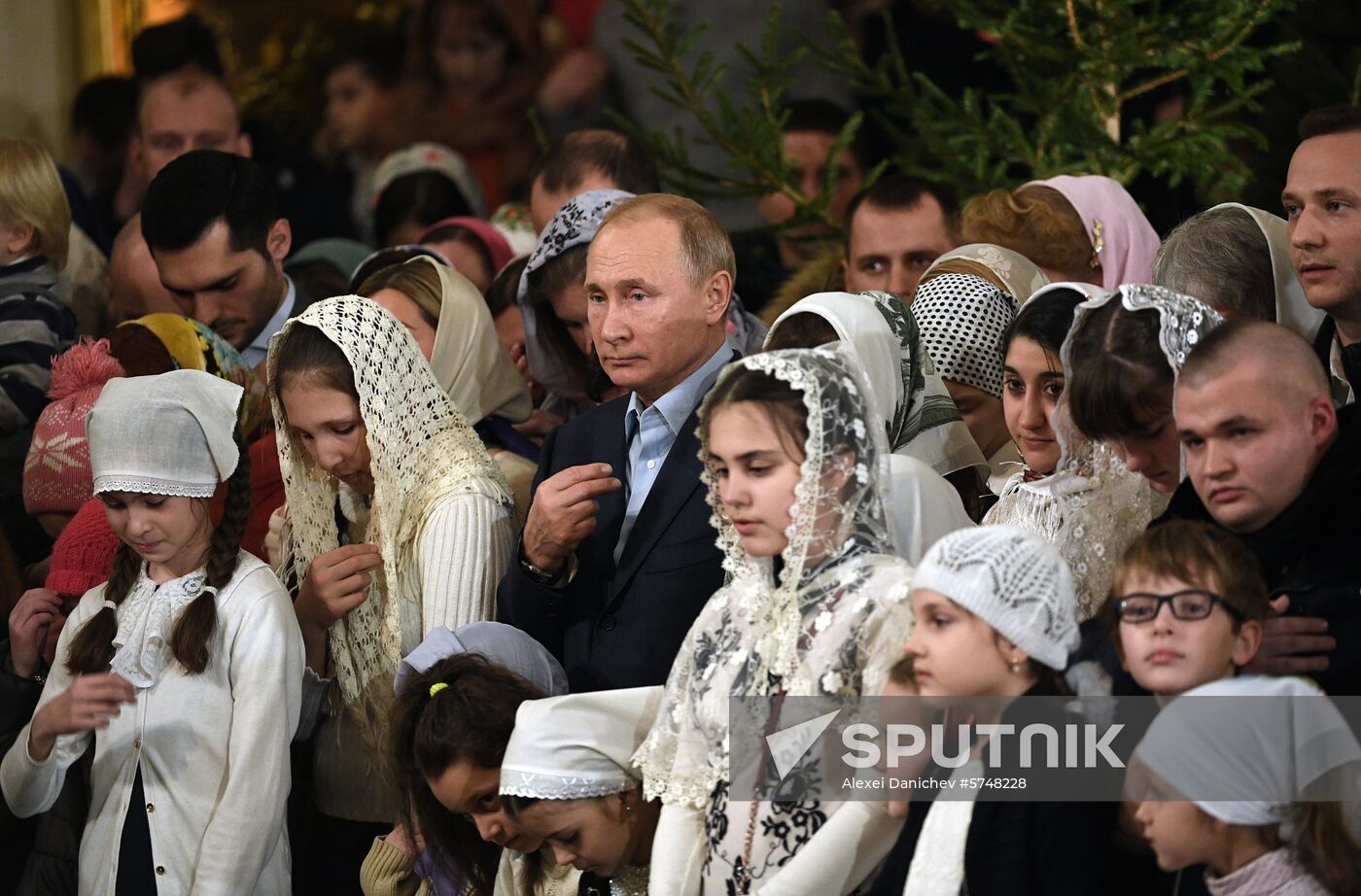 Russian President Putin attends Christmas service