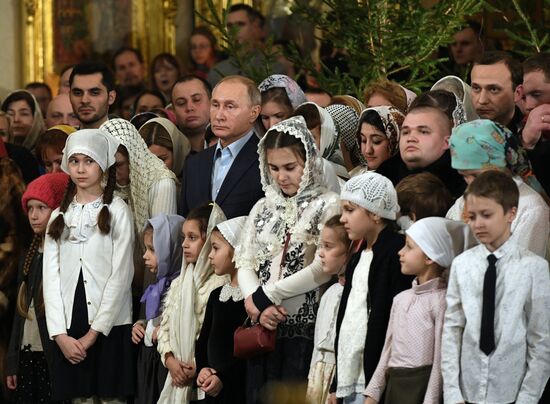 Russian President Putin attends Christmas service
