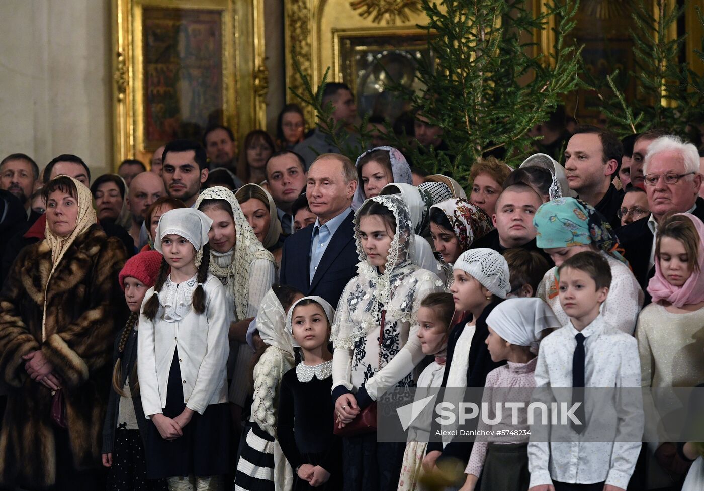 Russian President Putin attends Christmas service