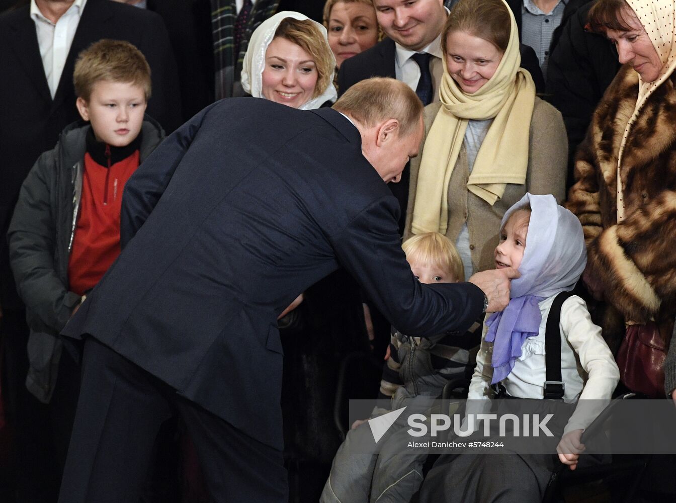 Russian President Putin attends Christmas service