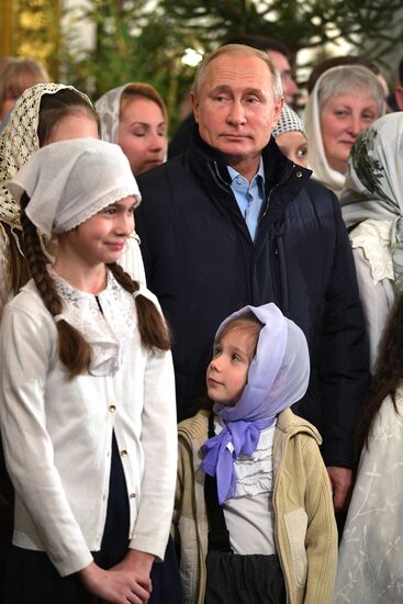 Russian President Putin attends Christmas service