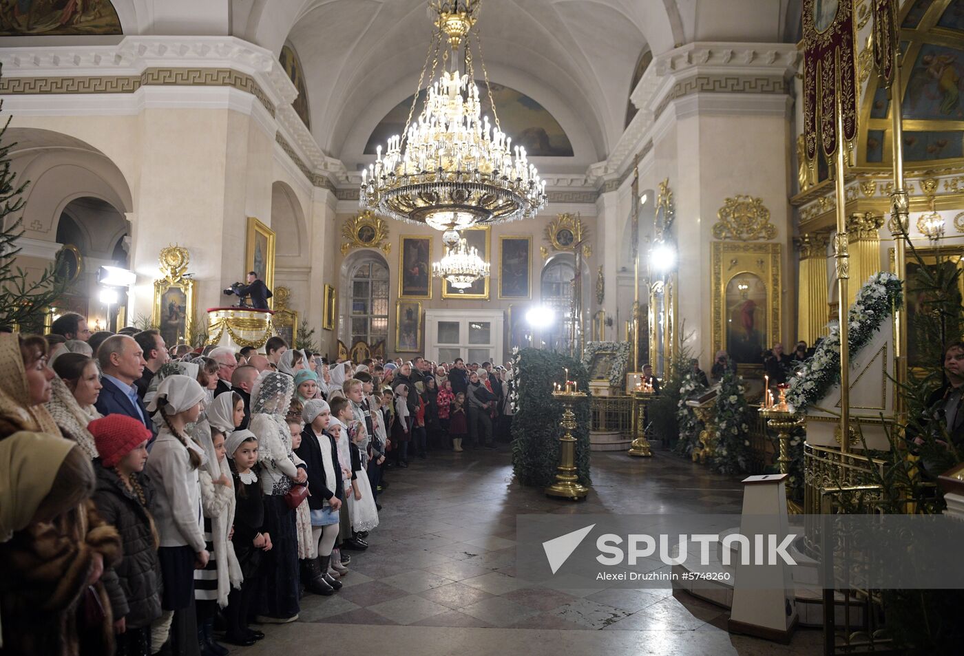 Russian President Putin attends Christmas service