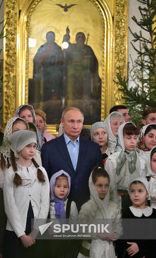 Russian President Putin attends Christmas service
