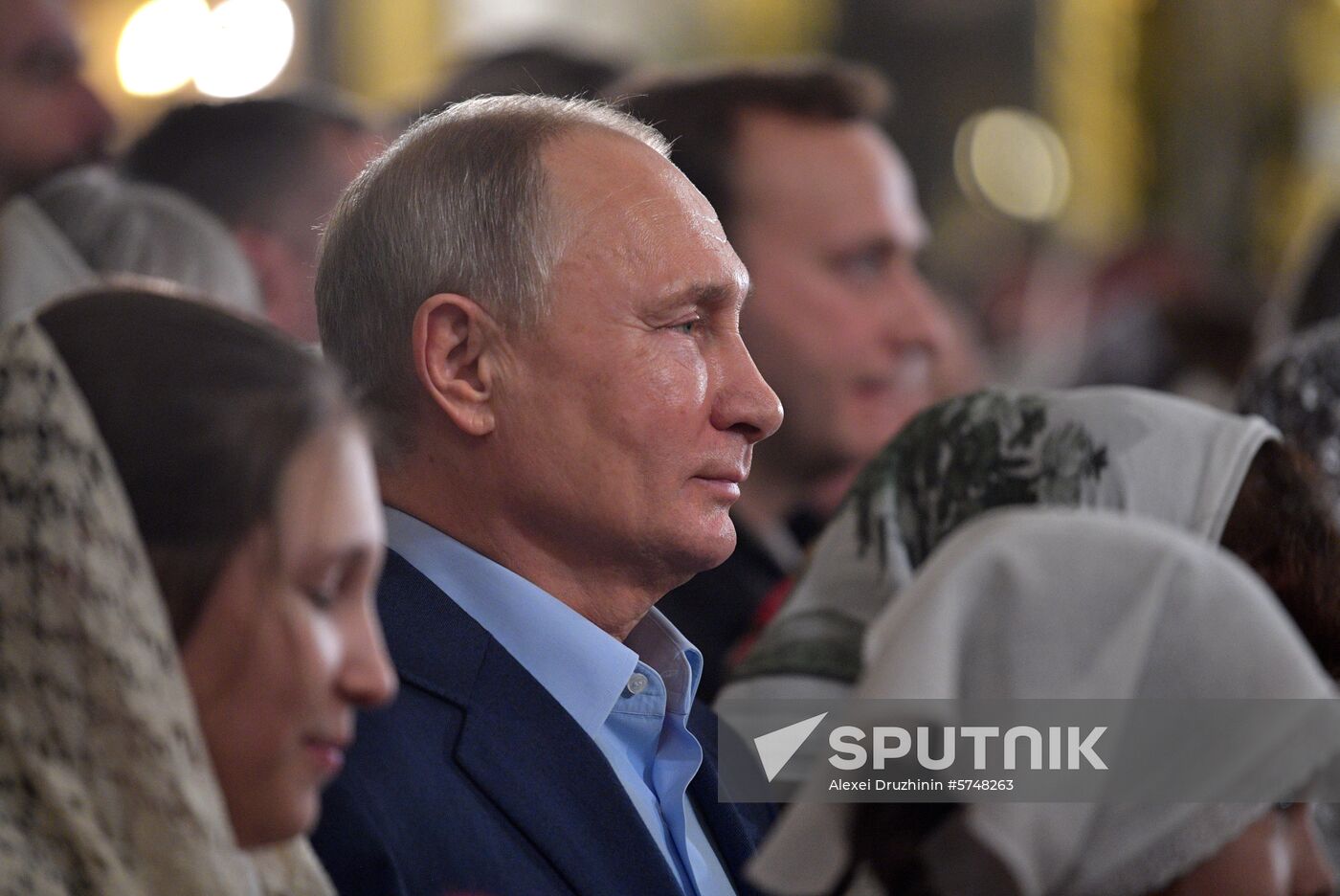 Russian President Putin attends Christmas service