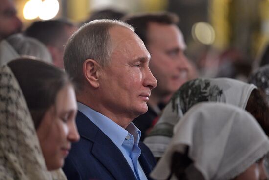 Russian President Putin attends Christmas service