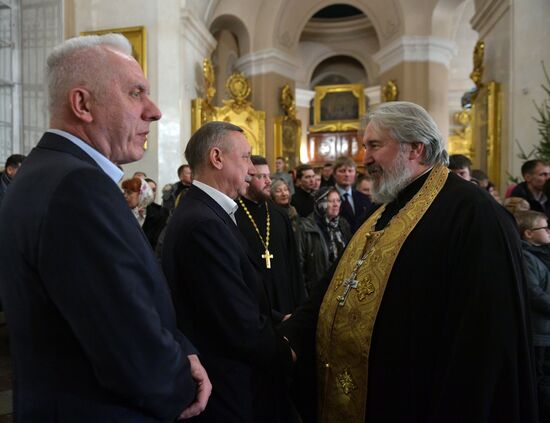 Russian President Putin attends Christmas service