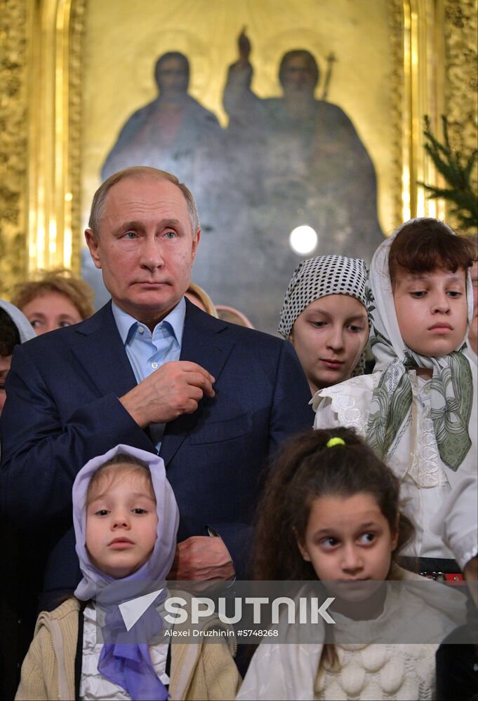 Russian President Putin attends Christmas service