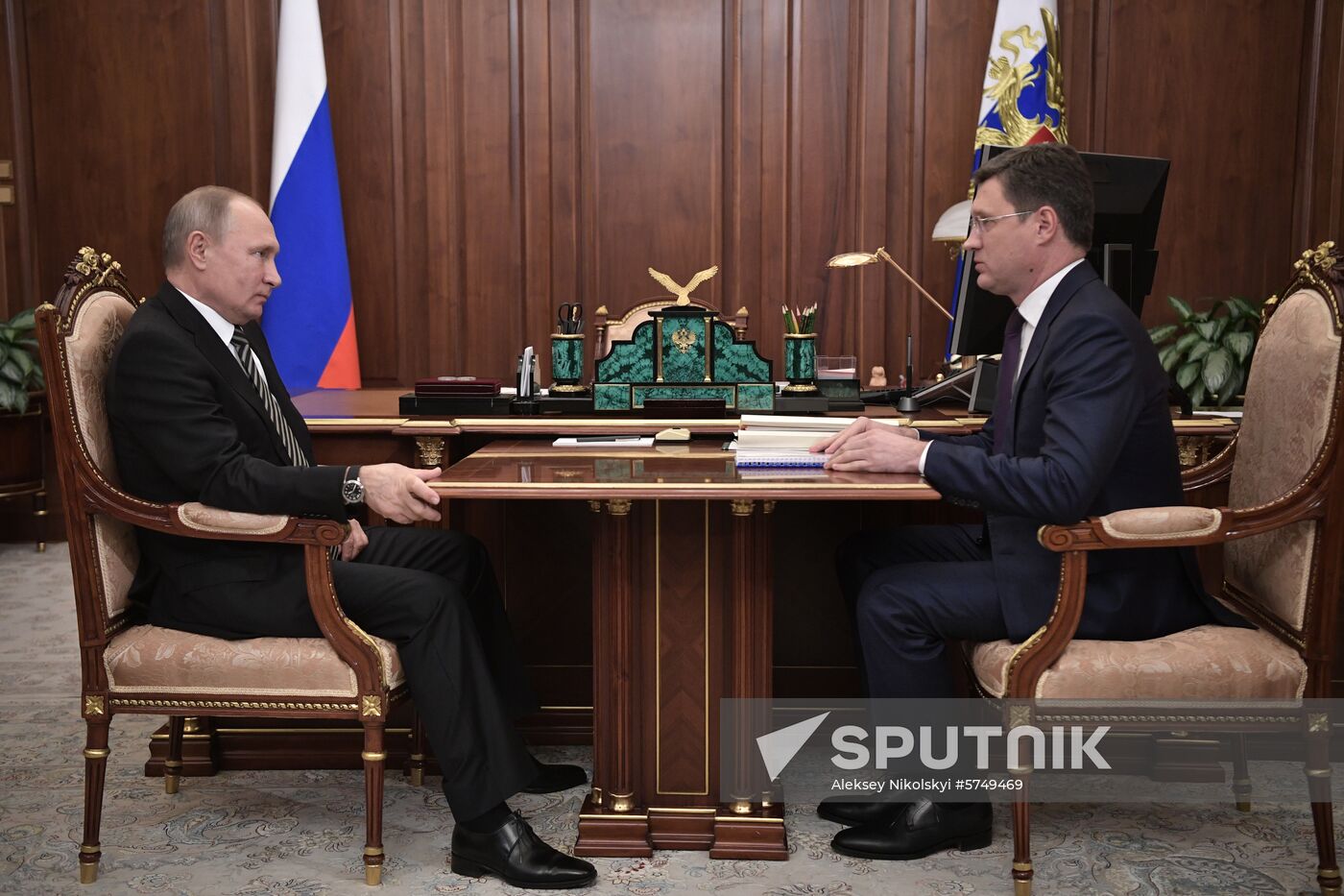 President Vladimir Putin meets with Energy Minister Alexander Novak