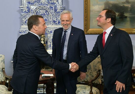 Prime Minister Dmitry Medvedev meets with ISO President John Walter