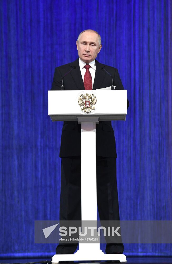 President Vladimir Putin speaks at gala evening to mark Defender of the Fatherland Day at Kremlin Palace