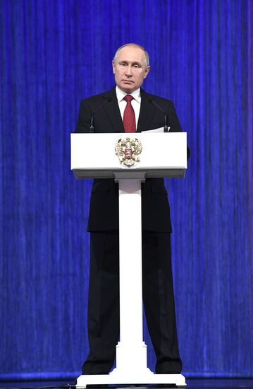 President Vladimir Putin speaks at gala evening to mark Defender of the Fatherland Day at Kremlin Palace