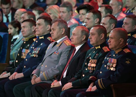 President Vladimir Putin speaks at gala evening to mark Defender of the Fatherland Day at Kremlin Palace